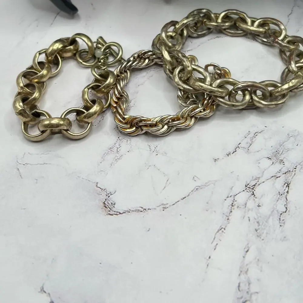 Set of 11 silver and gold tone bracelets